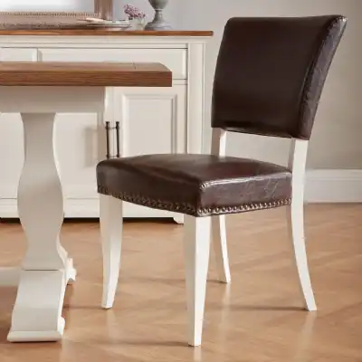 Pair of Ivory Painted Rustic Brown Leather Dining Chairs
