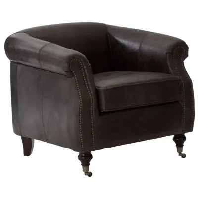 Grey leather rolled arm chair turned legs and castors