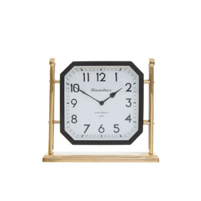 Small Octagonal Face Mantel Clock On Golden Pillars