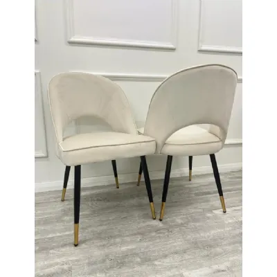 Modern Beige Velvet Upholstered Dining Chair with Open Back and Black Legs