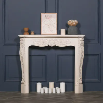 Aged Ivory Mahogany Carved Fire Surround