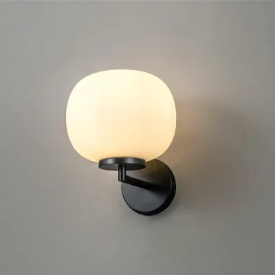 Sevenoaks Small Oval Ball Wall Light 1 Light E27 Matt Black Base With Frosted White Glass Globe