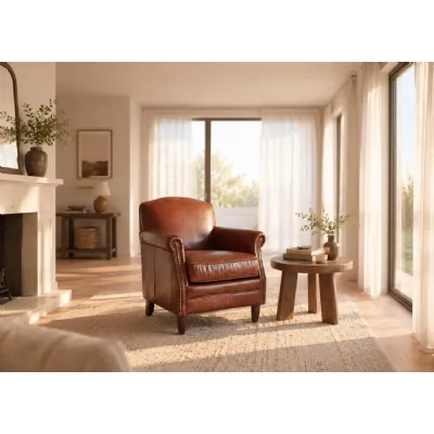Vintage Brown Distressed Leather Upholstered Armchair with Studded Detailing
