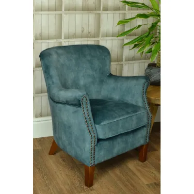 Vintage Style Teal Velvet Lounge Armchair with Stud Detailing and Curved Back