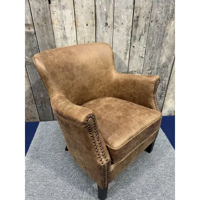 Vintage Style Brown Leather Lounge Armchair with Stud Detailing and Curved Back