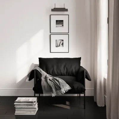 Modern Plush Onyx Black Armchair with Soft Cushions and Metal Frame