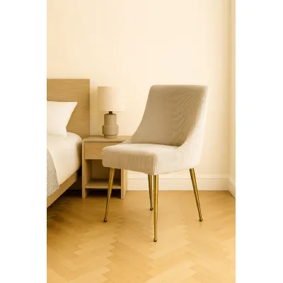 Modern Ivory Velvet Dining Chair with Ribbed Back and Gold Metal Legs