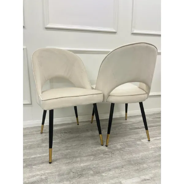 Modern Beige Velvet Upholstered Dining Chair with Open Back and Black Legs