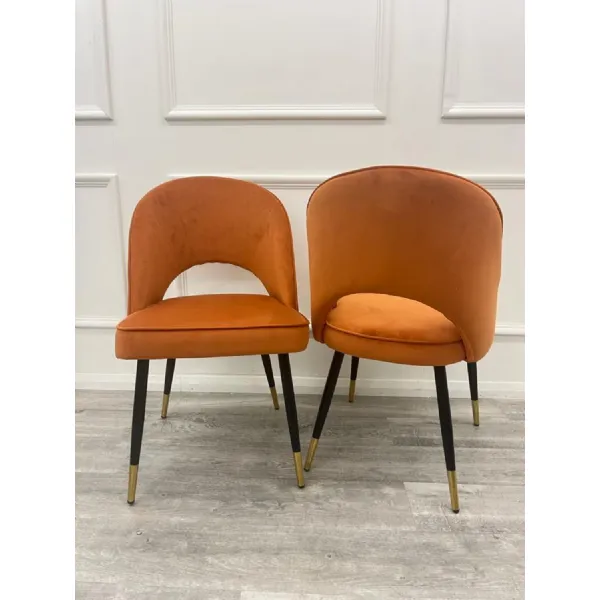 Modern Tan Velvet Upholstered Dining Chair with Open Back and Black Legs