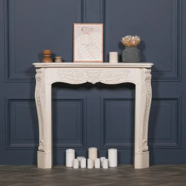 Aged Ivory Mahogany Carved Fire Surround